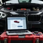 Car Diagnostic Manual Open on Laptop in Front of Open Engine Bay