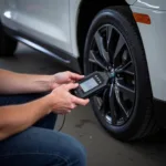 Mechanic performing a car diagnostic test