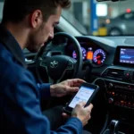 Mechanic performing a car diagnostic test