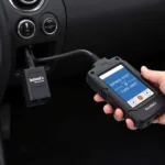 Car Diagnostic Tool Connected to Car