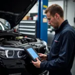 St Albans Car Diagnostics Technician Using a Diagnostic Tool