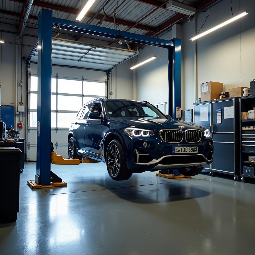 Car Lifted for Inspection in Garage