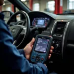 Mechanic using a diagnostic tool on a car