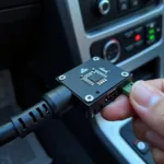 ELM327 Chip Connected to OBD-II Port