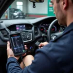 Halfords Technician Performing Car Diagnostics