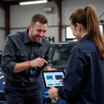 Hartlepool mechanic explaining diagnostics results to a car owner