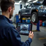 Mechanic Using Delphi Tablet