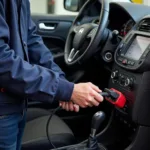 Mechanic Performing a Car Diagnostic Test