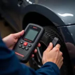 A mechanic using a professional diagnostic tool on a car's OBD port.