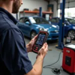 Mechanic Using Mini OBD2 Scanner