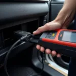 Mechanic Using OBD Scanner