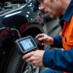 Mechanic Utilizing a Scan Tool for Car Diagnostics