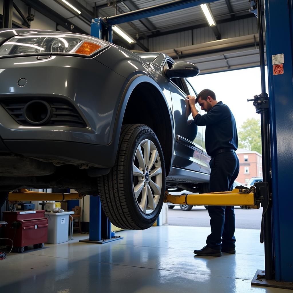 Car undergoing a routine maintenance check in Newton Abbot