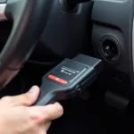 OBD-II Scanner Connected to Car