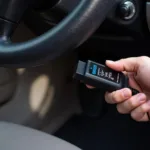 OBD Scanner Connected to Car