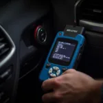 OBD-II code reader plugged into a car's OBD-II port