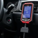 Universal OBD2 Scanner Plugged into a Car's Dashboard