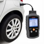 Vident iEasy300 OBD2 Scanner connected to a car's OBD2 port