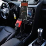 Android Car Diagnostic Tool Connected to OBD2 Port