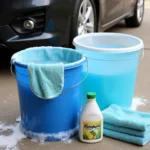 Basic car wash kit including two buckets, wash mitt, soap, and microfiber towels