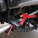 C-Clamp Holding Car Parts During Repair