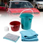 Essential car detailing wash kit including wash mitt, two buckets, and drying towels in the UK