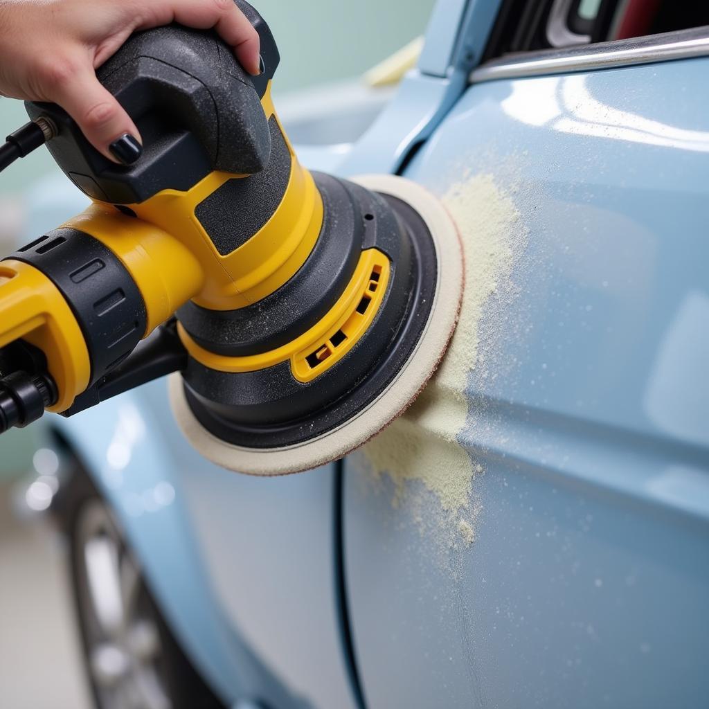 Car Paint Removal Using a Power Sander