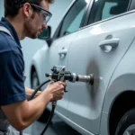 Applying Car Paint with a Spray Gun