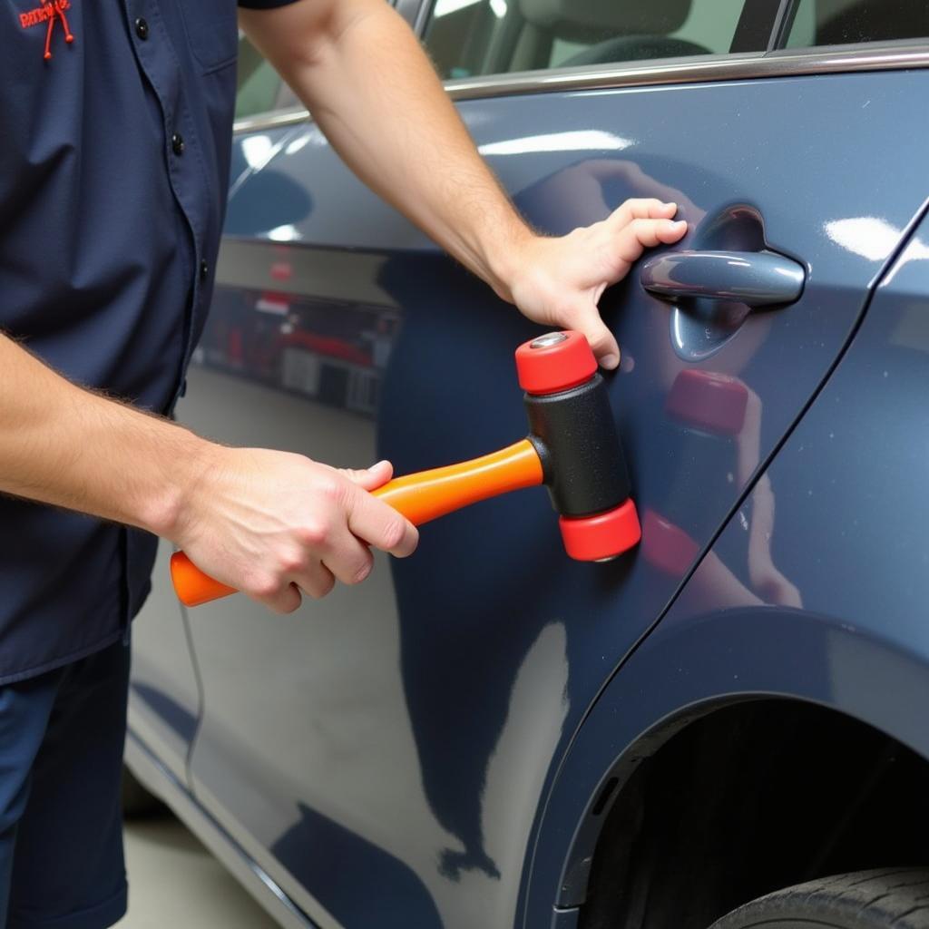 Applying a China Car Hammer Tool for Dent Repair