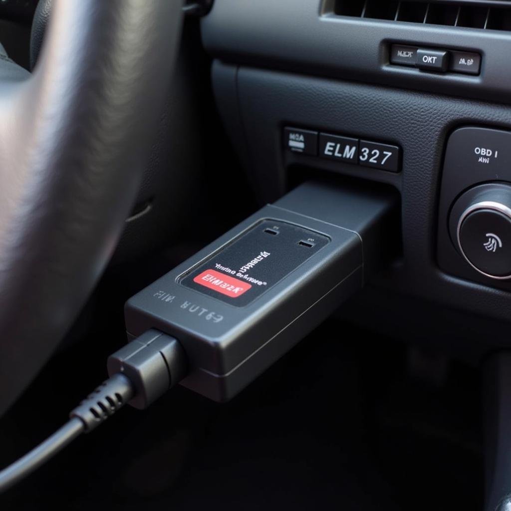 ELM327 Car Diagnostic Tool Connected to OBD-II Port