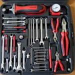 Essential Car Tools Kit Displayed on a Workbench