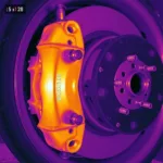 IR Camera Detecting Overheating Brake Caliper: Thermal image showing a hot spot on a car's brake caliper, indicating a potential problem.