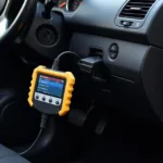 OBD2 Scanner Connected to Car