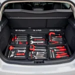 A well-organized car trunk with labeled tool compartments