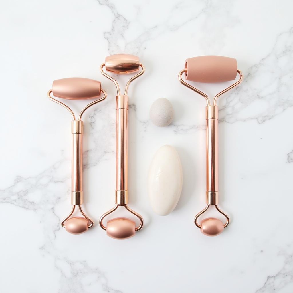 Rose Gold Skincare Tool Set on Marble Countertop