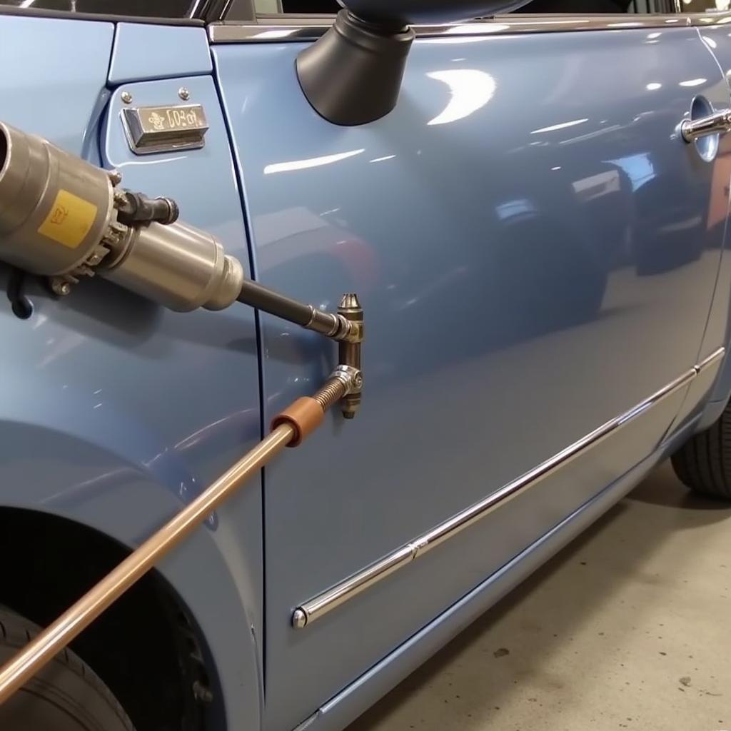 Slide Hammer Dent Pulling on a Car Door