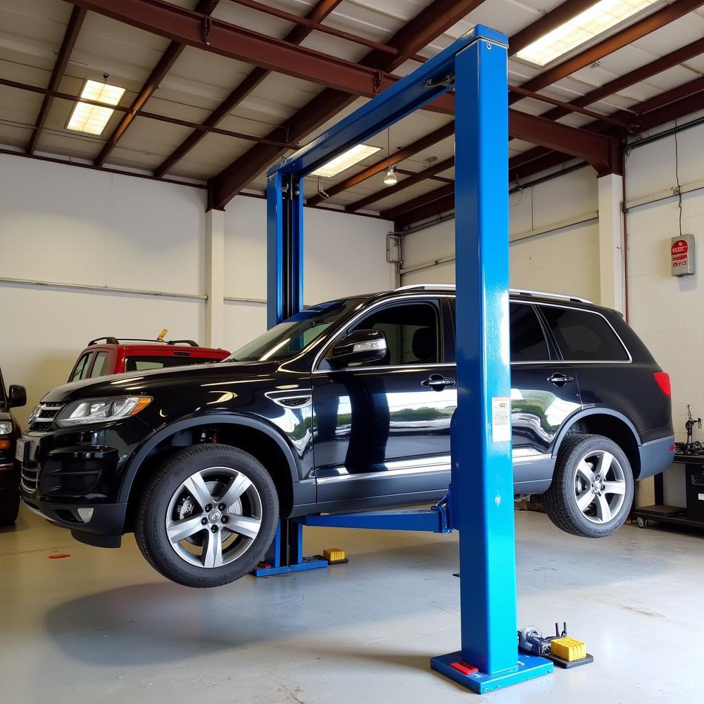 Two-Post Triangle Car Lift in a Workshop