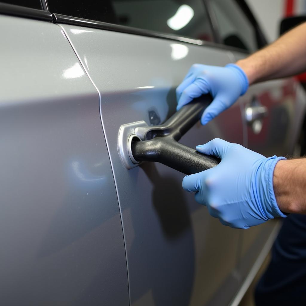 Using a Glue Pulling System for Dent Repair