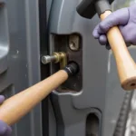 Using a Car Lock Punch Tool to Remove a Damaged Cylinder