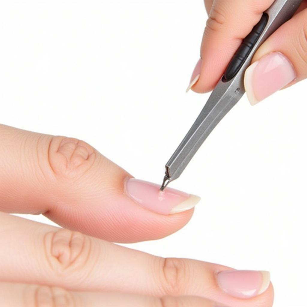 Correct technique for using a cuticle pusher on fingernails.