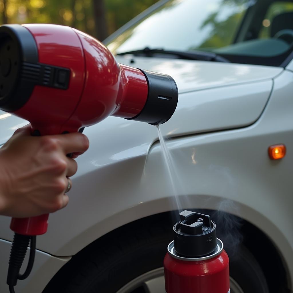 Using a Hair Dryer and Compressed Air for Dent Removal