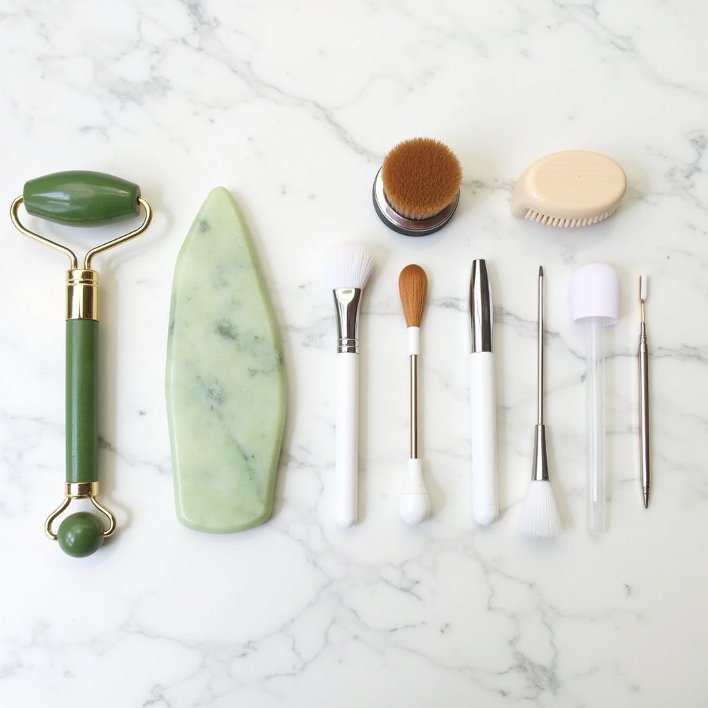 Variety of Skin Care Tools on Marble Background