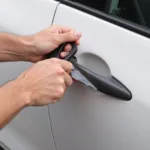 Applying Car Wrap with Tucking Tool