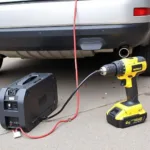 Car Battery Powering a Power Tool with an Inverter