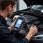 A mechanic using a car code clearing tool 5000 to diagnose a car's engine.