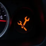 Car dashboard with the tool symbol illuminated