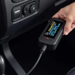 Car Diagnostic Tool Code Reader Connected to OBD Port