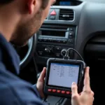 Mechanic using a car diagnostic tool to read Diagnostic Trouble Codes (DTCs) from a vehicle's onboard computer.