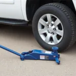 Car jack lifting a vehicle