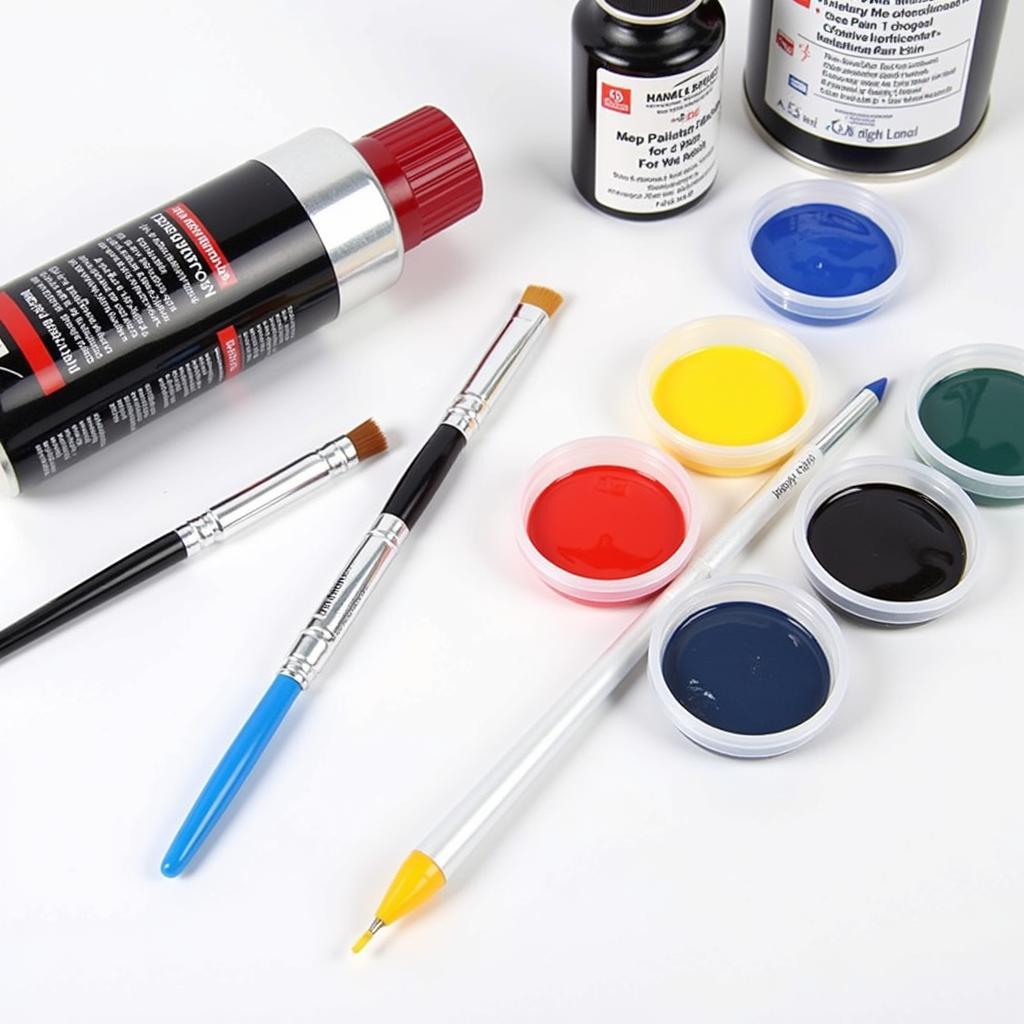 Car paint touch up tools kit with various applicators and paint colors.